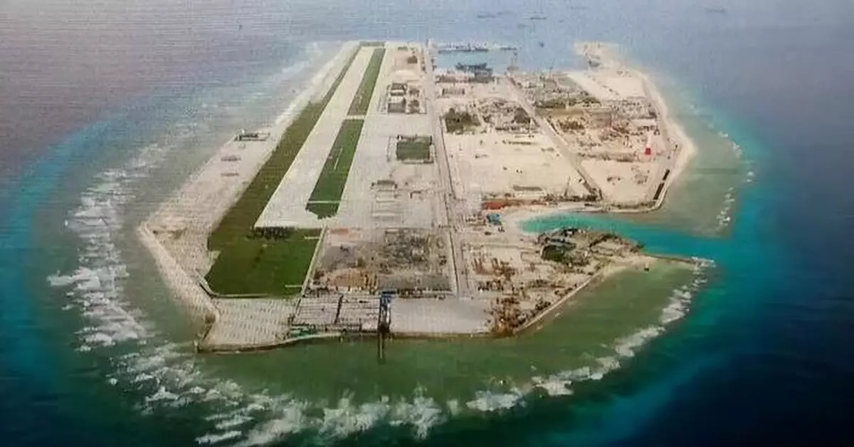 22艘挖泥船日夜狂填西沙羚羊礁，面積激增至15平方公里，解放軍南海戰略鎖喉鏈成形