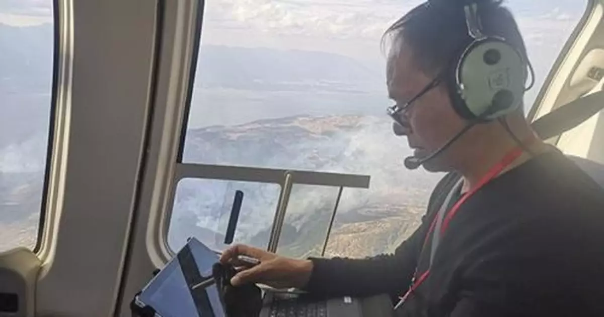 多搶救幾畝森林！冒直升機極限風速也要「向火而飛」