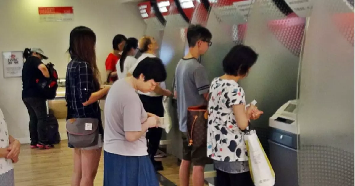 網民發起「全民撳錢日」  金管局提醒銀行戒備