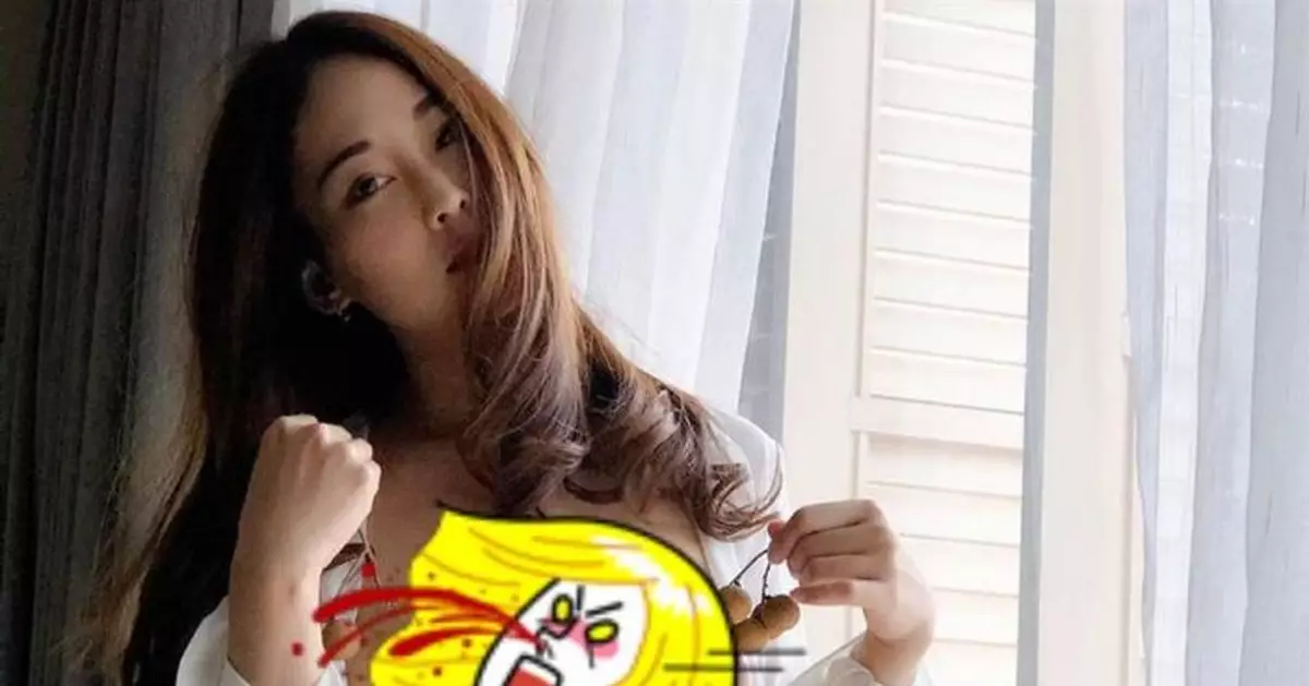 逆天辣媽開襟曬乳 拿龍眼羞遮兩點