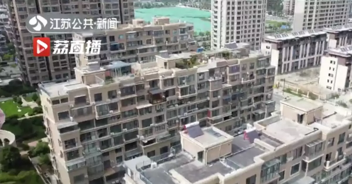 江蘇連雲港一小區頂樓違建難拆除 竟有42戶公職人員