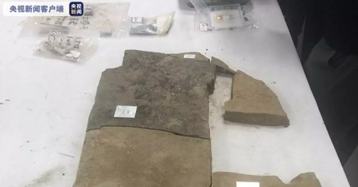 三星堆8號坑出土一件石磬 或為中國最大