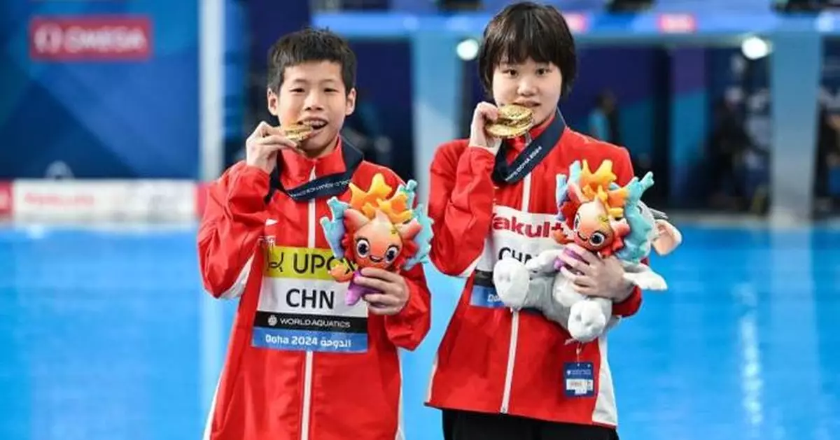 中國跳水組合張家齊與黃建傑奪世錦賽混雙10米台金牌