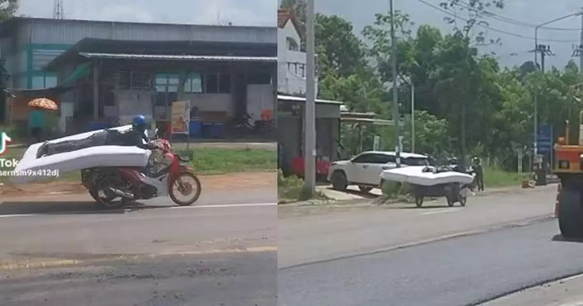 泰國街頭驚現「床墊騎士」淡定揸車   送貨員揸車送床墊兩不誤