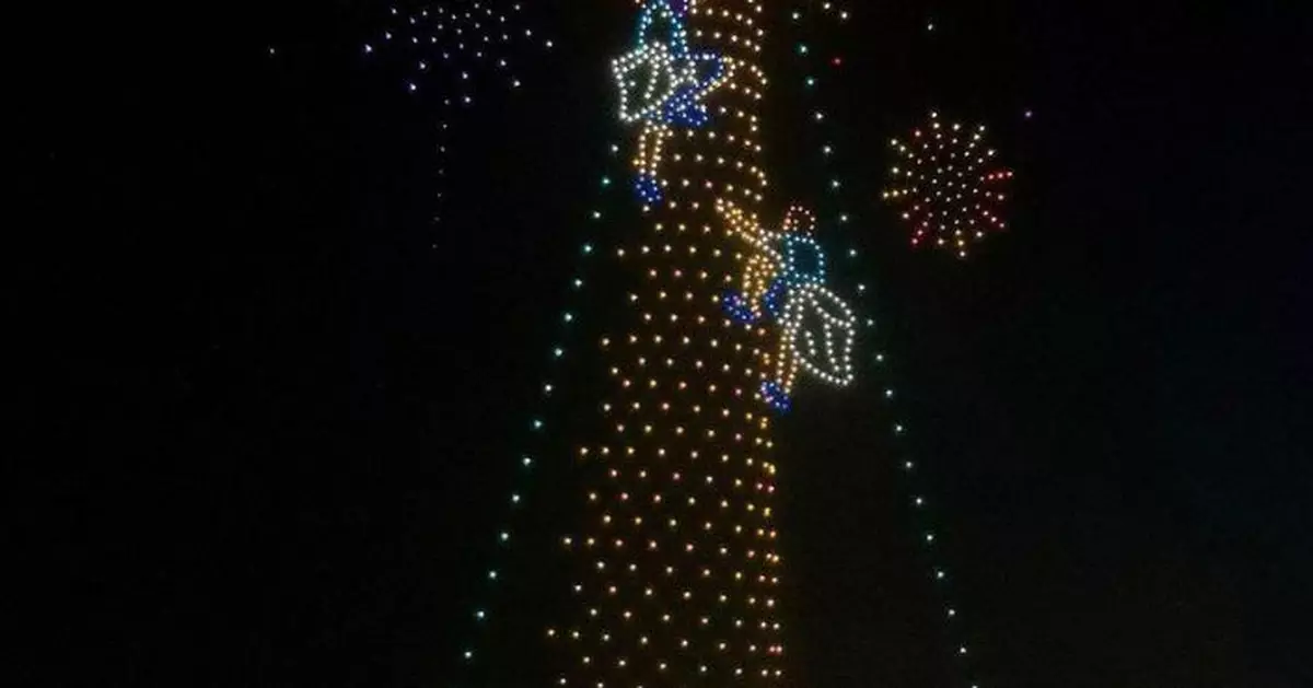 千架無人機宣傳非遺節慶 灣仔夜空呈現搶包山圖案