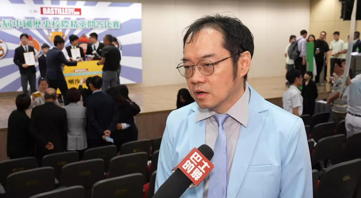 聖公會聖彼得小學帶隊老師陳偉光。巴士的報記者攝