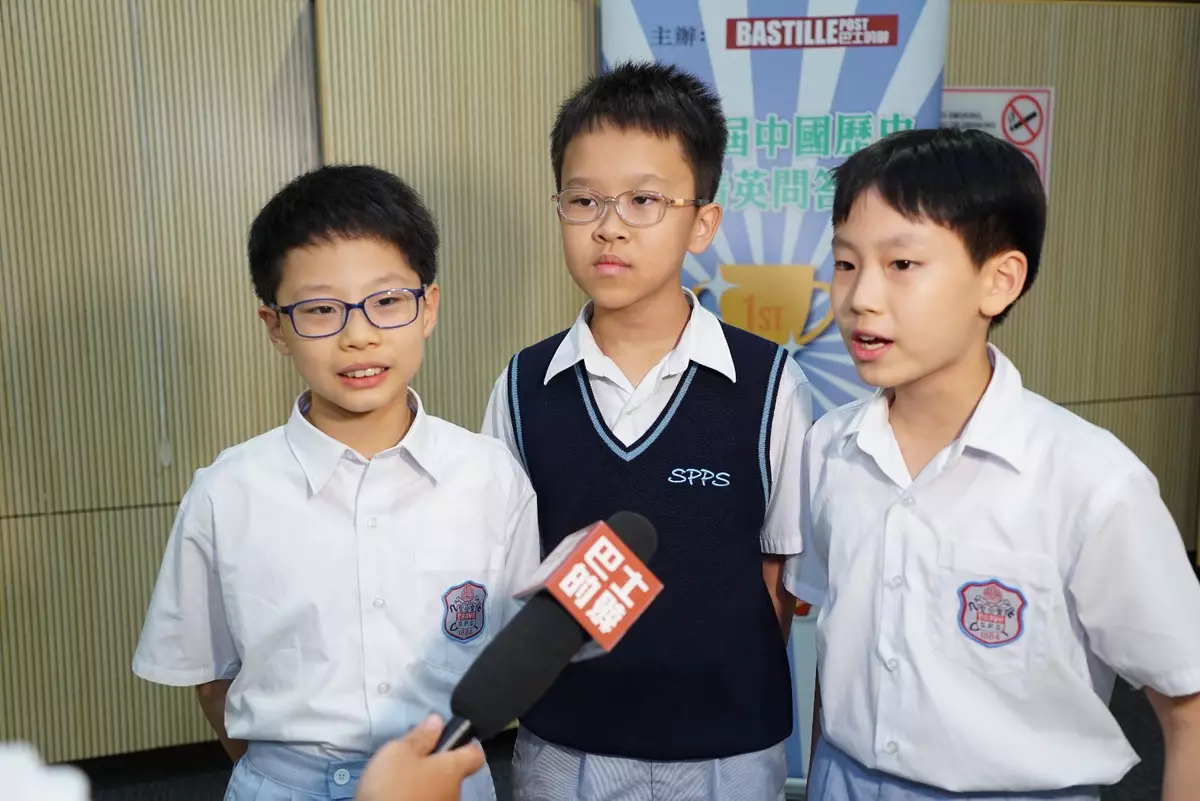 聖公會聖彼得小學參賽同學,左起賀銘淳、蔣林軒和王圖南。巴士的報記者攝