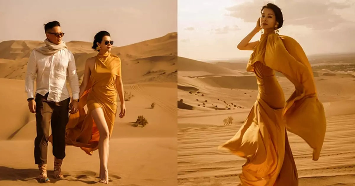 胡杏兒敦煌絕美放閃  金色高衩露背裝曬逆天長腿 與老公沙漠牽手浪漫如電影