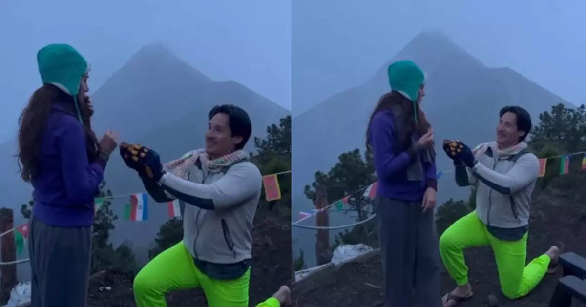 美情侶山頂上演史詩級浪漫求婚 身後火山突噴發成「最佳見證」