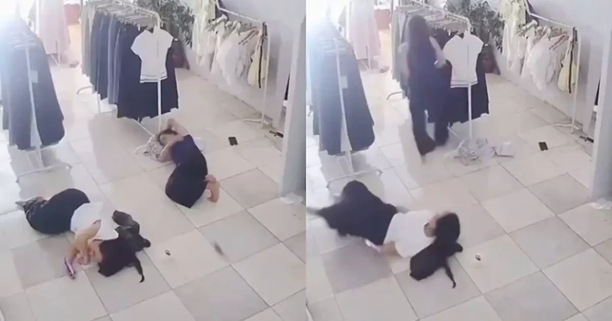 躺地休息突遭老鼠鑽褲管 巴西服裝店女職員嚇到彈起狂跳甩落