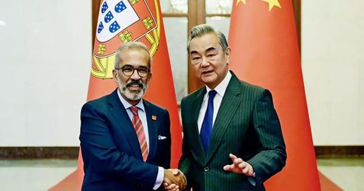 王毅晤葡國外長指中葡談判解決澳門問題 樹立和平解決爭端典範