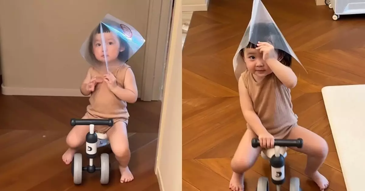李璨琛2歲細囡Sucy創意滿分 踩車笠透明File當頭盔擋風