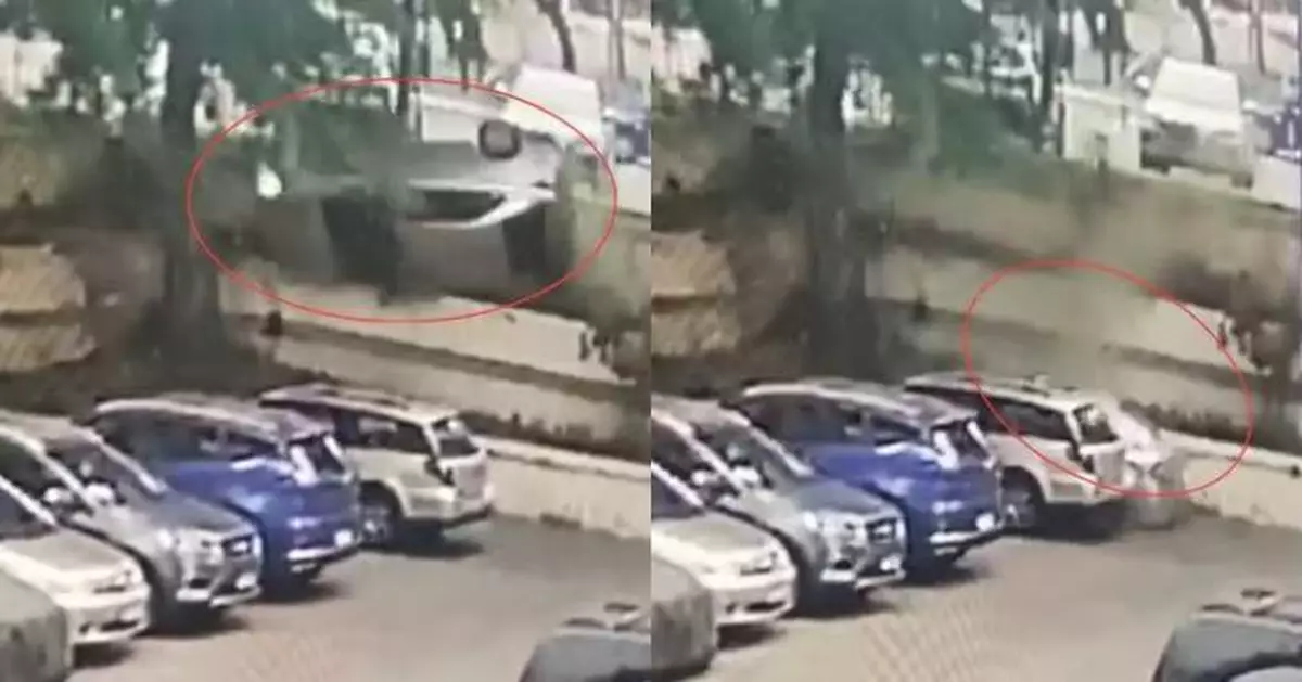 智利8旬婦駕車誤踩油門衝破圍欄墮停車場 車輛竟完美泊進車位！