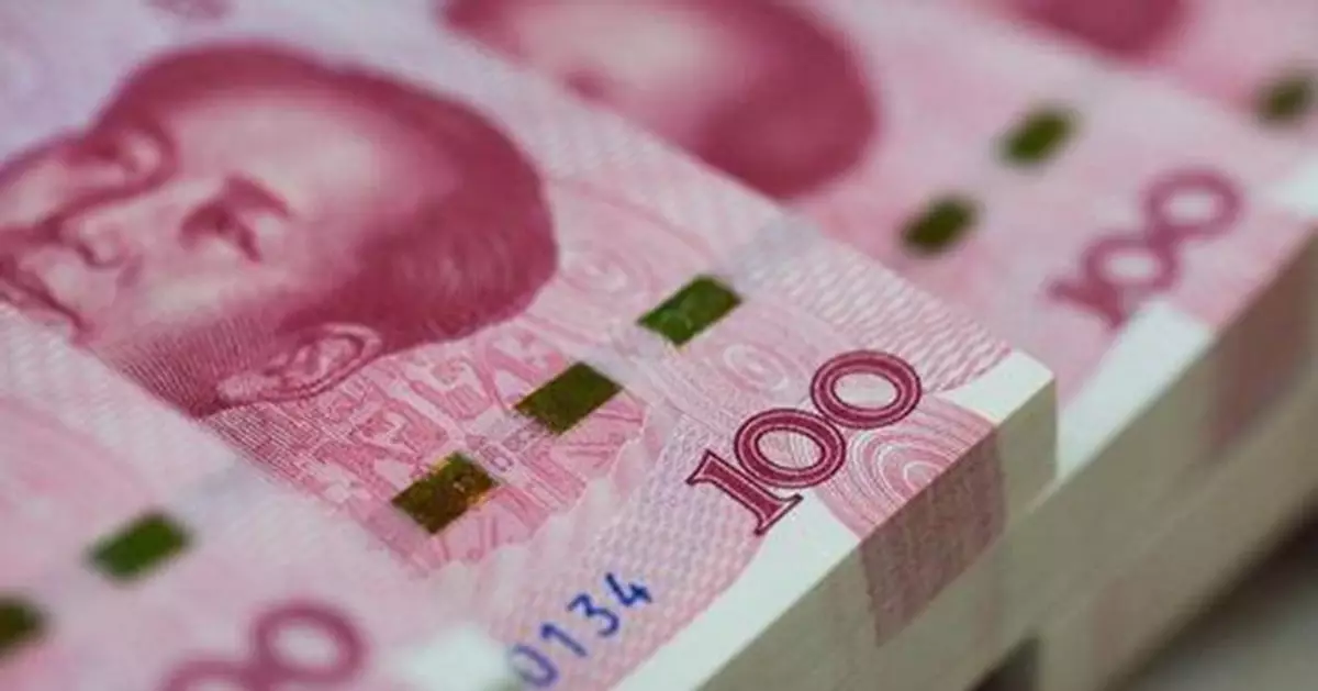 人民幣兌美元中間價升40點   創13個月新高