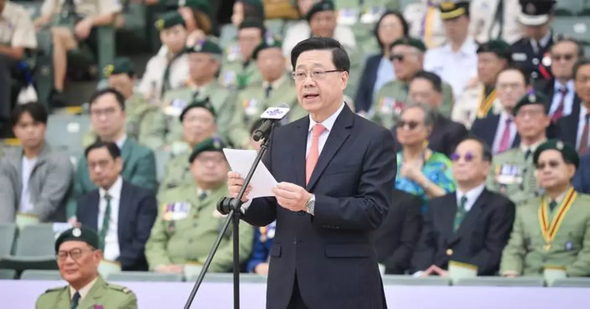 李家超出席童軍大會操 籲團結一致立法會選舉踴躍投票