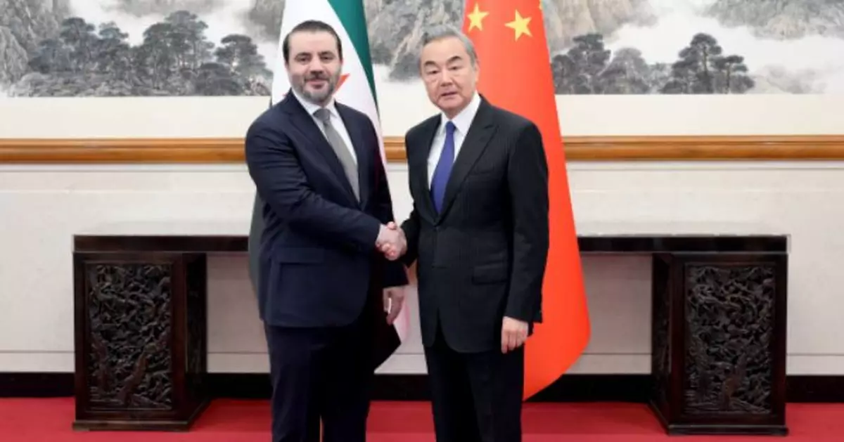王毅晤敘利亞外長 稱中方願積極考慮參與敘國經濟重建