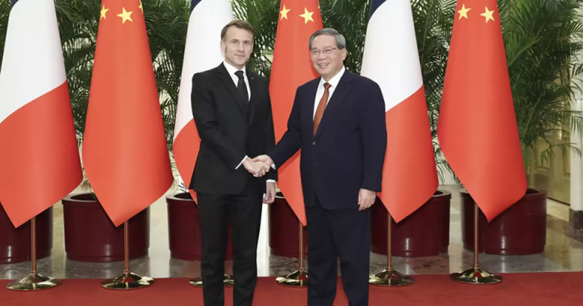 李強晤馬克龍稱中方願努力鞏固政治互信　冀法國推動歐盟堅持中歐伙伴定位