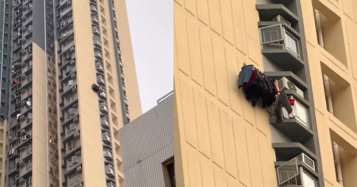 屋邨高層單位伸出晾衫神棍 數十件衣物如「紅杏出牆」　網民憂安全但疑有苦衷