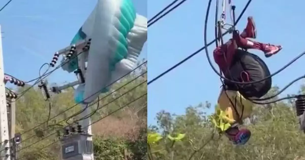 美遊客赴泰玩滑翔傘受困高壓電線桿 當局停電近1小時救援助安全脫險