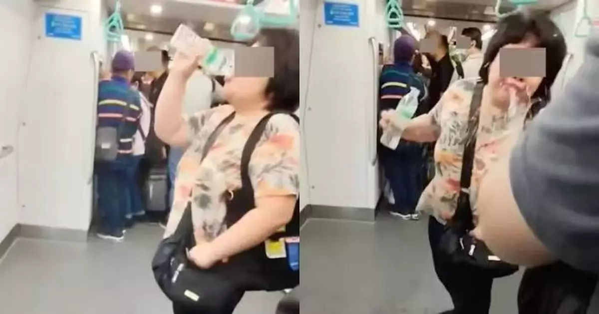 婦人新加坡地鐵內朝乘客噴水46秒內連噴10次 女乘客忍無可忍奪水瓶制止