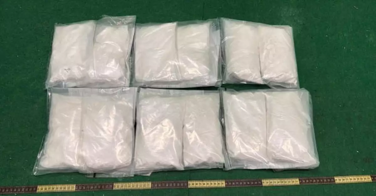 木酒盒夾層藏可卡因市值約310萬元　32歲男子吉隆坡抵港被捕