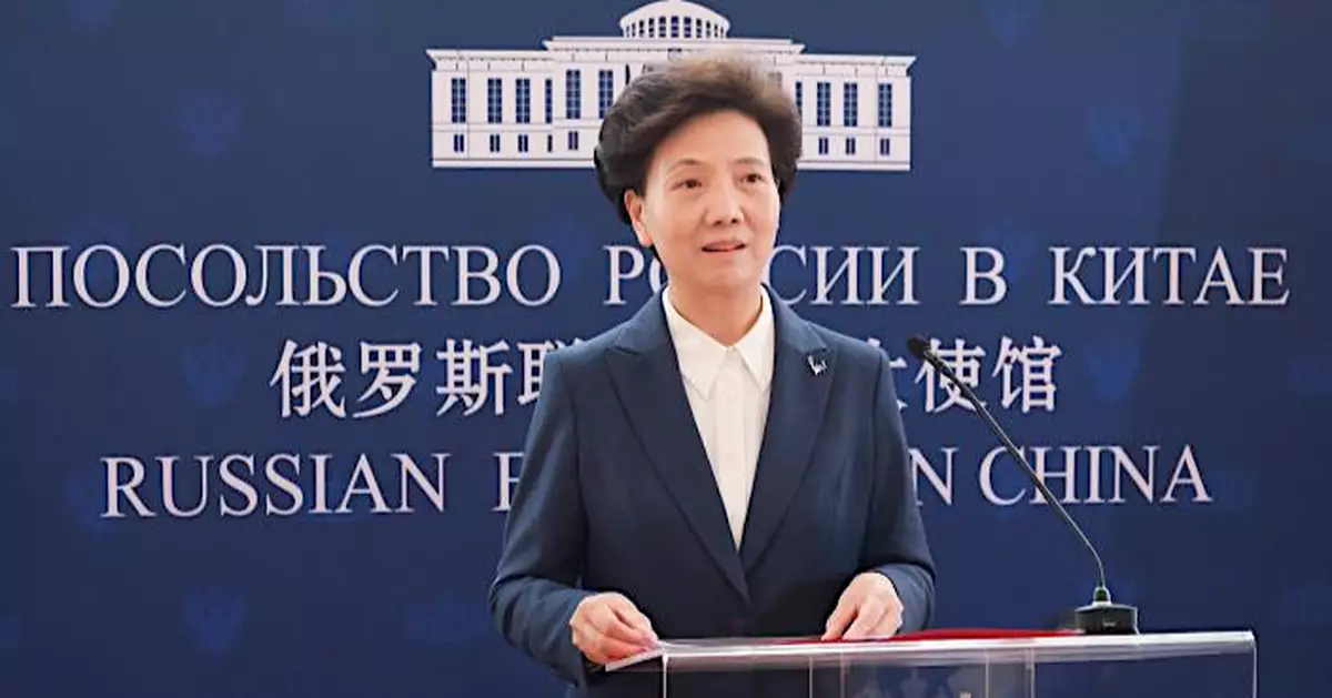 諶貽琴受邀訪問西班牙及意大利 米蘭出席冬奧會開幕式