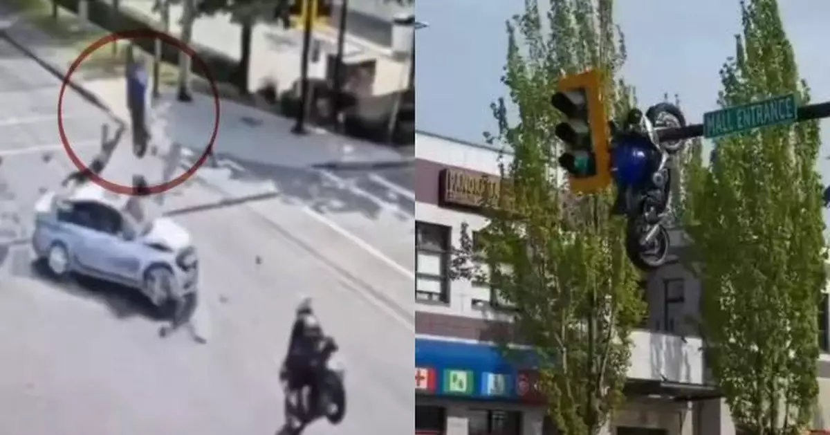 加拿大爆離奇車禍 電單車遭私家車撞飛高掛交通燈桿上 途人驚呼似電影特效