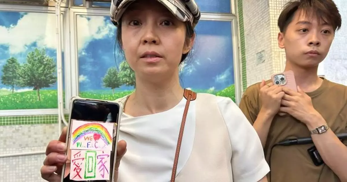 大埔火災｜有宏志閣居民帶孩子彩虹圖畫上樓 貼上窗戶表達「愛回家」心情