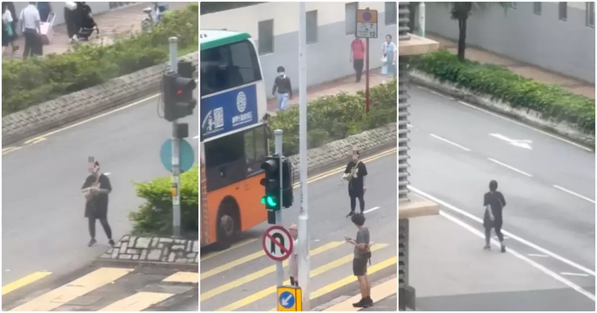 神秘黑衣女企馬路中央搖頭晃腦原地轉　網民：大地任我行