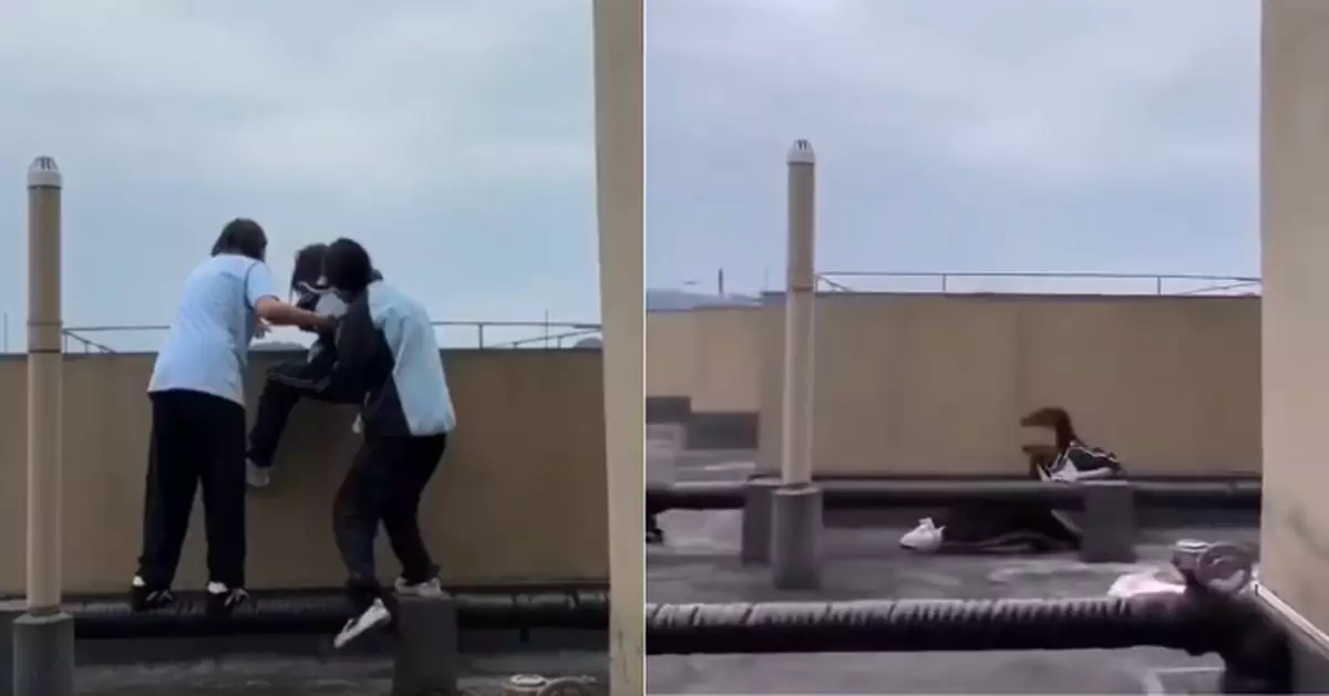 驚悚！內地兩女生天台抱同學懸空推向邊緣　教師及時喝止免悲劇