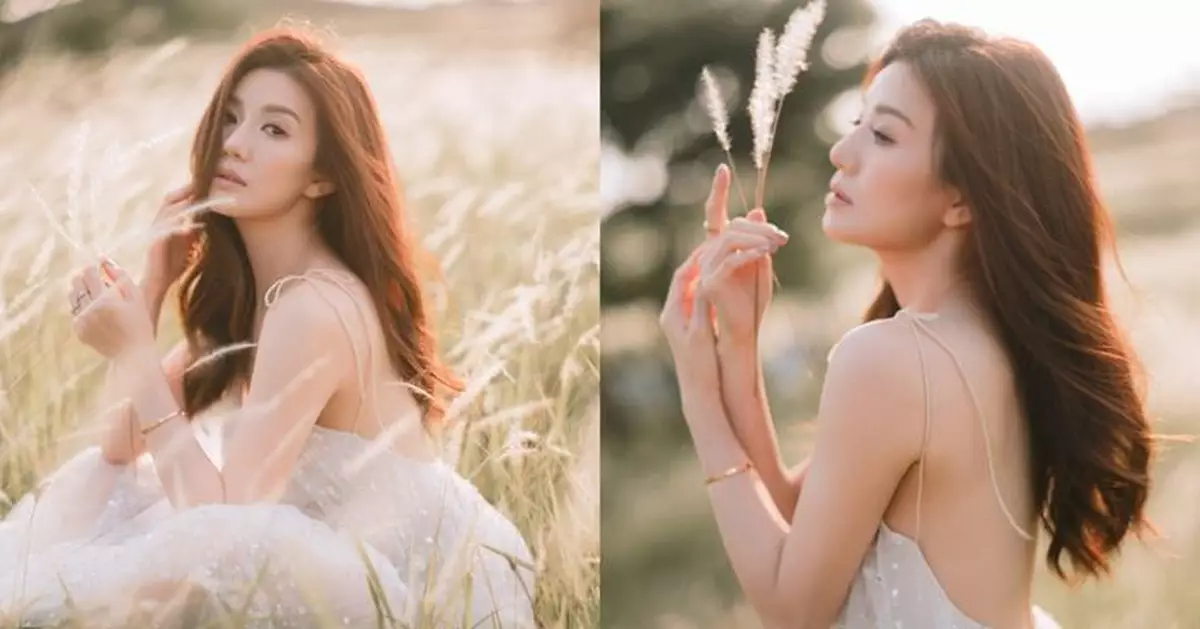 張美妮芒草田晒白滑玉背 化身逆光女神