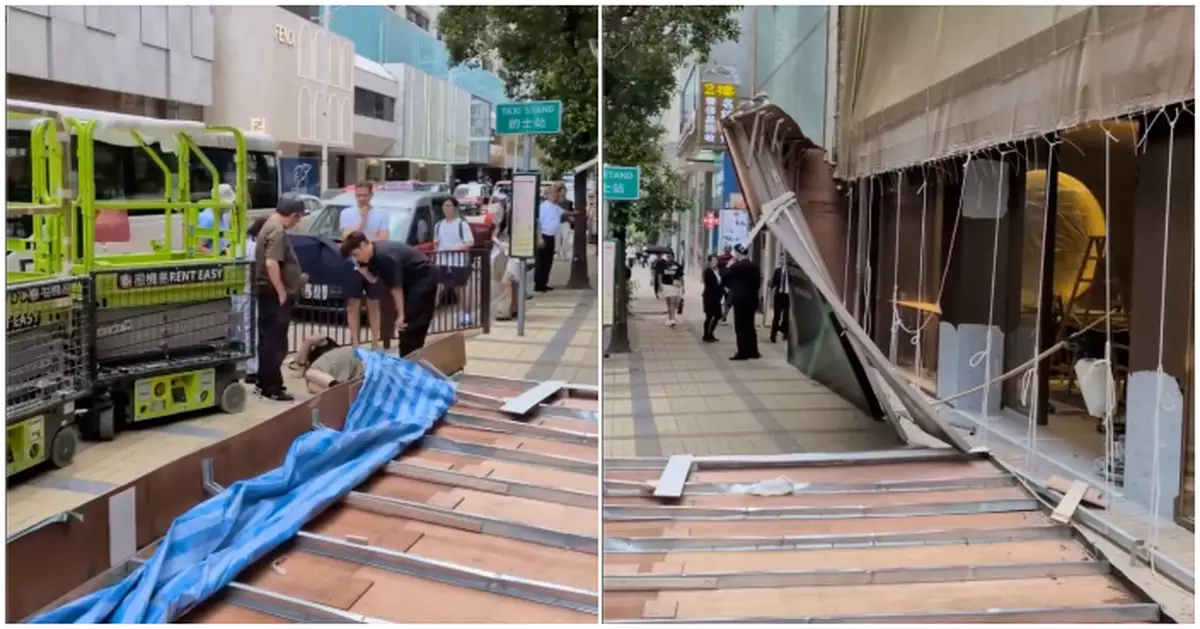 1號風球下尖沙咀店舖大型圍板不敵強風倒塌　女途人遭擊中腿傷送院