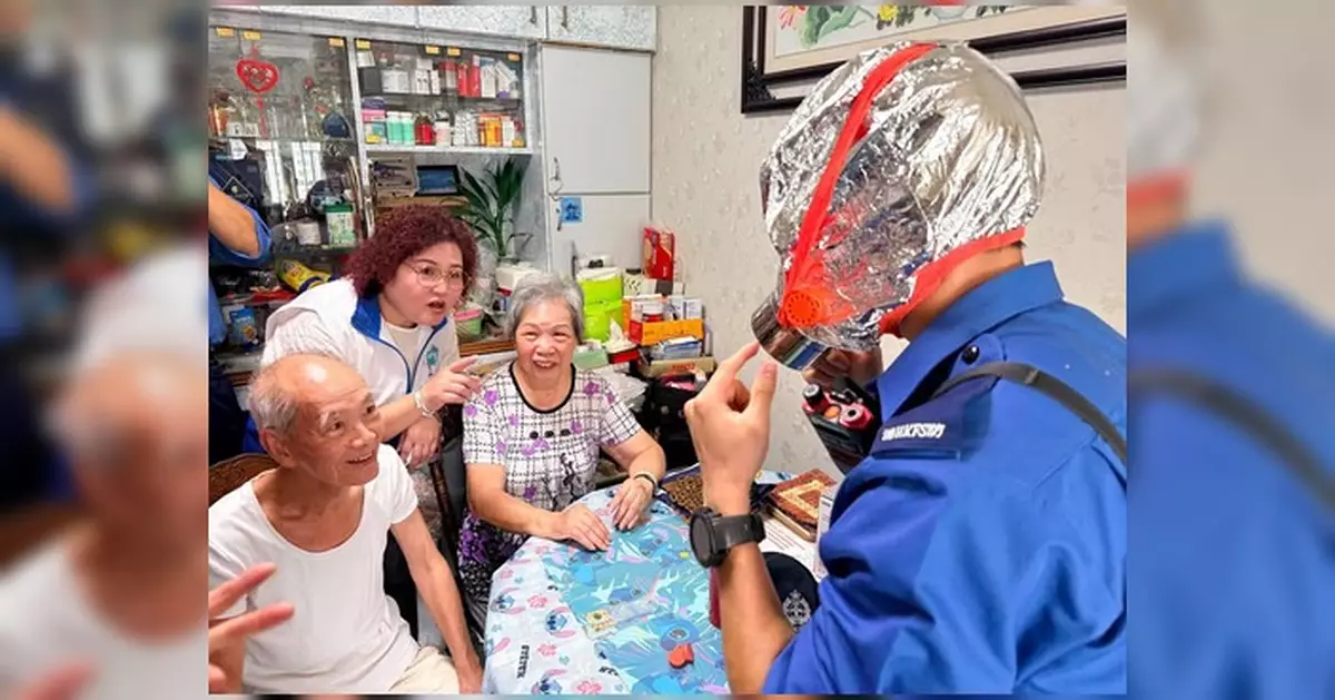 消防處聯同屯門區委員會及關愛隊 良景邨兆隆苑宣揚防火信息