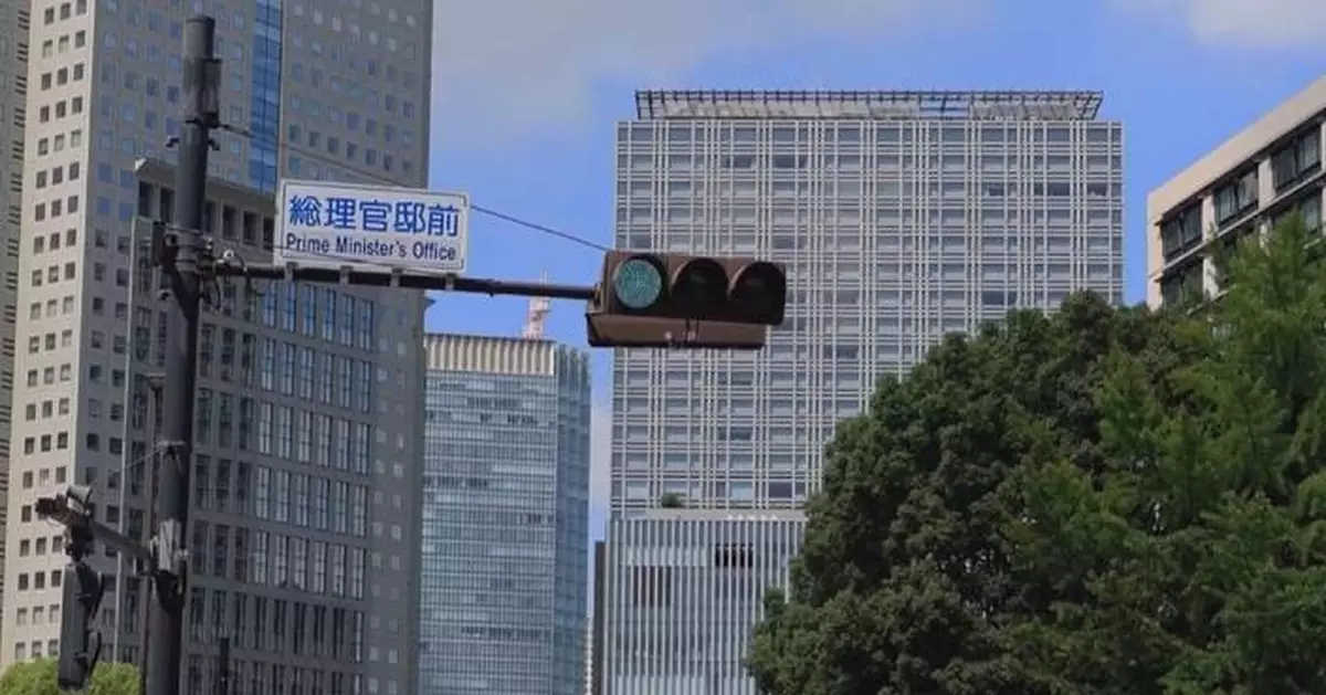 日本首相宣布改組自民黨領導層及內閣