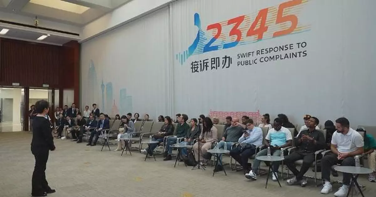 北京市民服務熱線結合人工智能 外國記者讚賞效率