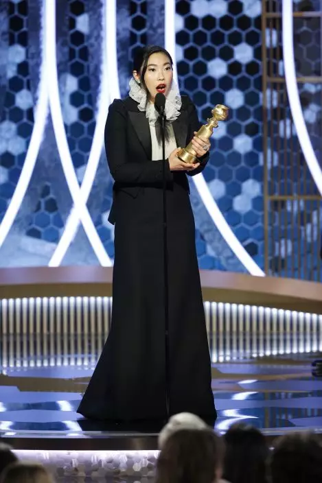This image released by NBC shows Awkwafina accepting the award for best actress in a motion picture comedy for her role in "The Farewell" at the 77th Annual Golden Globe Awards at the Beverly Hilton Hotel in Beverly Hills, Calif., on Sunday, Jan. 5, 2020. (Paul DrinkwaterNBC via AP)
