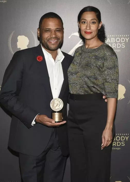 FILE - Actors Anthony Anderson, left, and Tracee Ellis Ross pose with their award for the television show "Black-ish", at the 75th Annual Peabody Awards Ceremony on May 21, 2016, in New York. The series put an affluent and devoted family of color at the center of attention and let Black creators tell their stories. The series finale airs Tuesday, April 19. (Photo by Evan AgostiniInvisionAP, File)