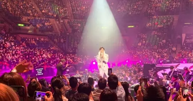 中心表示，4名在不同日子到過紅館觀看歌手張敬軒演唱會的人士確診。（觀眾提供）