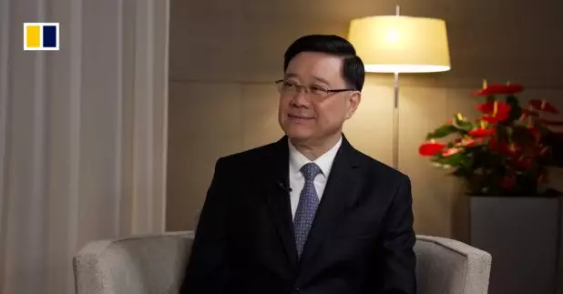 李家超說,香港的成功因素在於開放,以發展為貿易樞紐。(《南華早報》片段截圖)