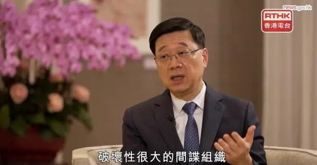李家超說，特區政府不斷完善維護國家安全的相關法律制度和執行機制，有信心現行法律足夠確保安全。（政府新聞網影片截圖）