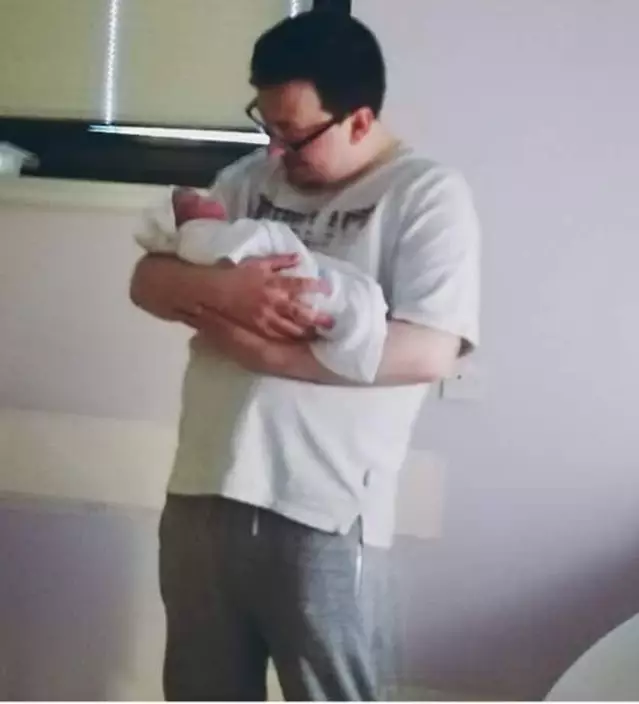 Ali and his new baby daughter, Lanah (PA Photo)