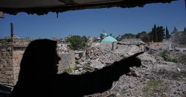 Residents return to a southern Lebanese village after a US-brokered agreement, in photos