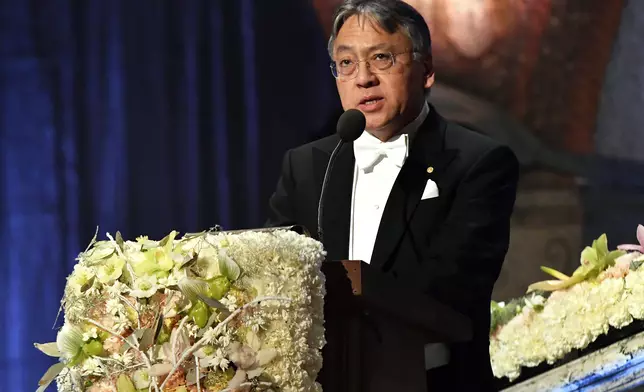 Kazuo Ishiguro, laureate in literature delivers a speech, during the Nobel banquet in the City Hall, in Stockholm, Sunday, Dec. 10, 2017. (Fredrik Sandberg/TT News Agency via AP)