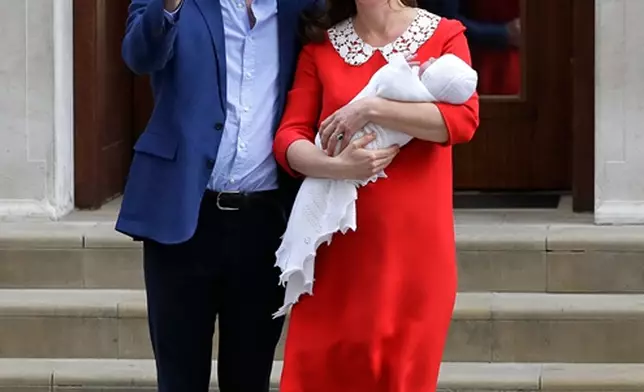 Britain's Prince William and Kate, Duchess of Cambridge pose for a photo with their newborn baby son as they leave the Lindo wing at St Mary's Hospital in London London, Monday, April 23, 2018. The Duchess of Cambridge gave birth Monday to a healthy baby boy — a third child for Kate and Prince William and fifth in line to the British throne. (AP Photo/Kirsty Wigglesworth)