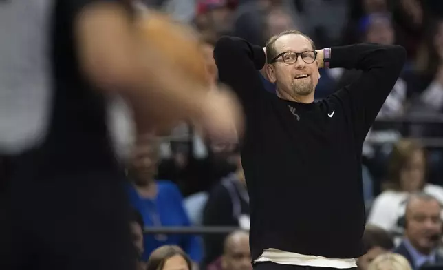 Philadelphia 76ers head coach Nick Nurse reacts to a foul called on the 76ers in the first half of an NBA basketball game against the Sacramento Kings in Sacramento, Calif., Monday, March 25, 2024. (AP Photo/José Luis Villegas)