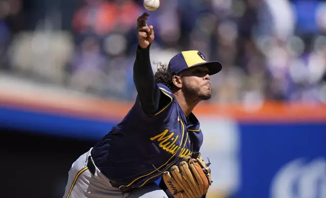 Milwaukee Brewers' Freddy Peralta pitches during the first inning of a baseball game against the New York Mets Friday, March 29, 2024, in New York. (AP Photo/Frank Franklin II)