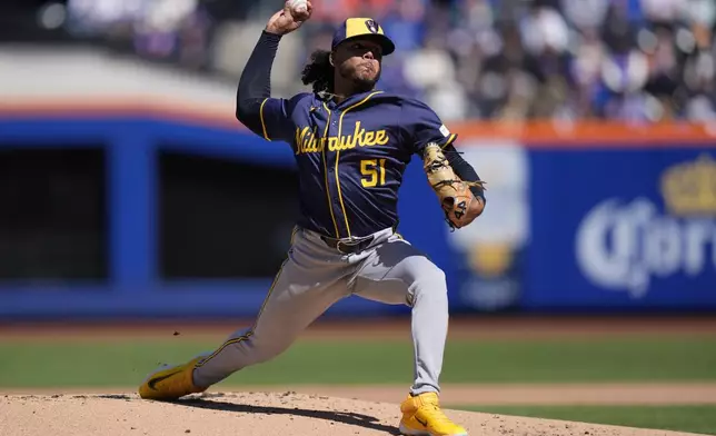 Milwaukee Brewers' Freddy Peralta (51) pitches during the first inning of a baseball game against the New York Mets Friday, March 29, 2024, in New York. (AP Photo/Frank Franklin II)