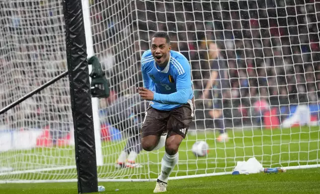 Belgium's Youri Tielemans celebrates after scoring his side's second goal during an international friendly soccer match between England and Belgium at Wembley Stadium, in London, Tuesday, March 26, 2024. (AP Photo/Kirsty Wigglesworth)