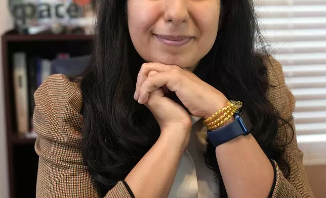 Florida state Rep. Anna Eskamani poses in her office Wednesday, March 27, 2024, in Orlando, Fla. For the first time in 27 years, the U.S. government is announcing changes to how it categorizes people by race and ethnicity. "It feels good to be seen," said Eskamani, whose parents are from Iran. (AP Photo/John Raoux)