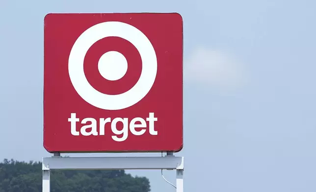FILE - A sign outside a Target store is seen Wednesday, May 24, 2023, in Nashville, Tenn. Don't count on a favorite store being open on Easter Sunday. Several stores will be closed March 31, 2024, in observance of the holiday. (AP Photo/George Walker IV)